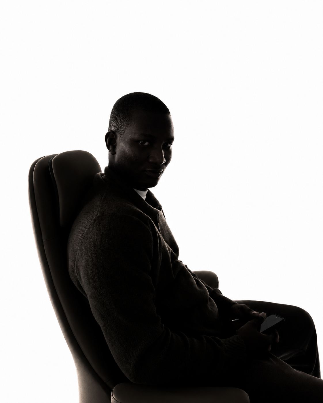 Portrait of Njay, full-stack software engineer, in a working environment